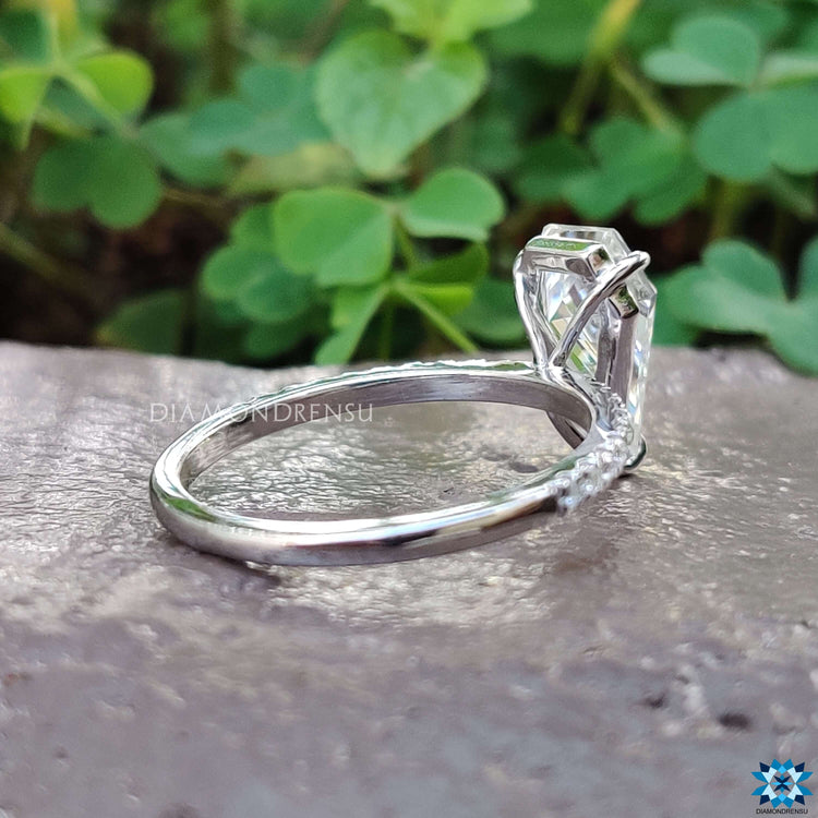 Custom engagement ring with spear moissanite and pave setting.
