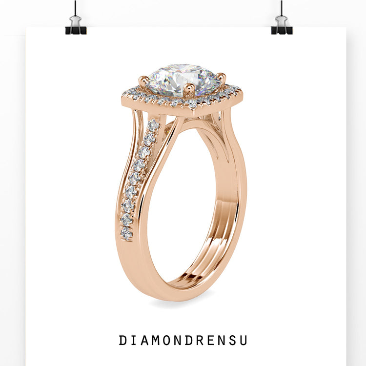 Halo engagement ring with round diamond in white gold.