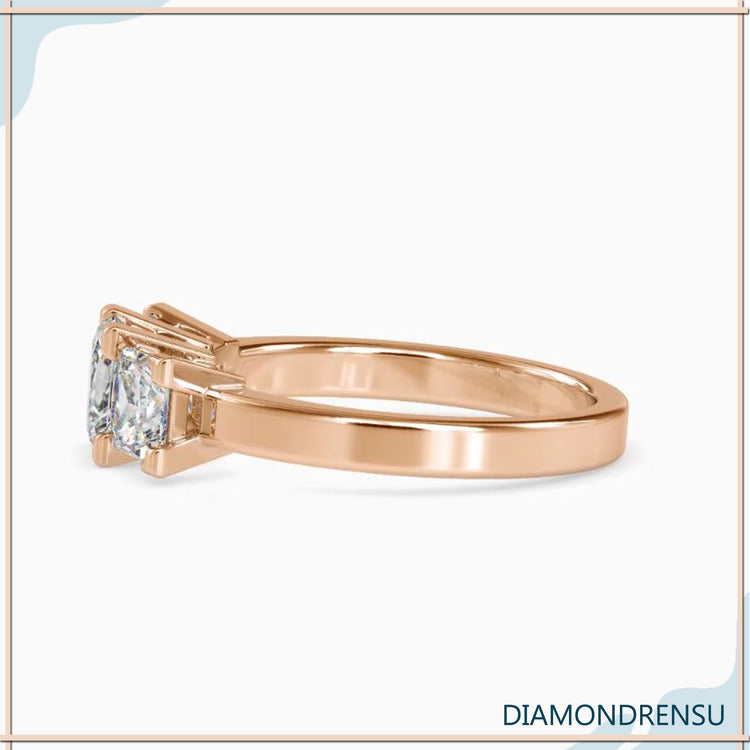 Diamondrensu UK ring featuring princess cut diamond trio.