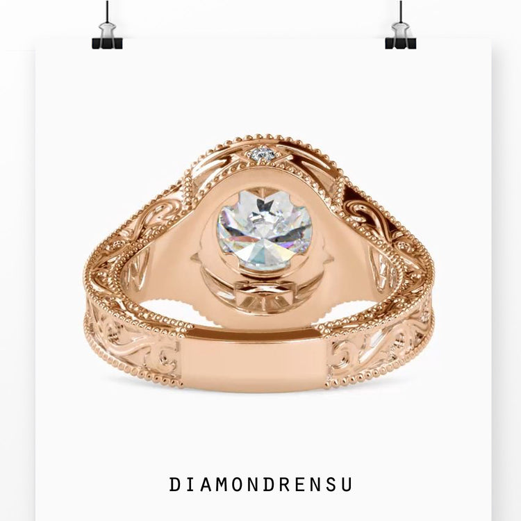 Rose gold split shank ring with milgrain edging.