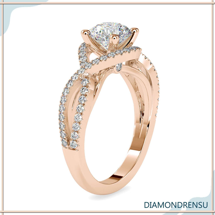 Twisted pavé diamond ring in rose gold with detailed accents.