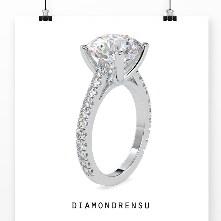 Cathedral setting ring with raised shoulders and a secure diamond fit.