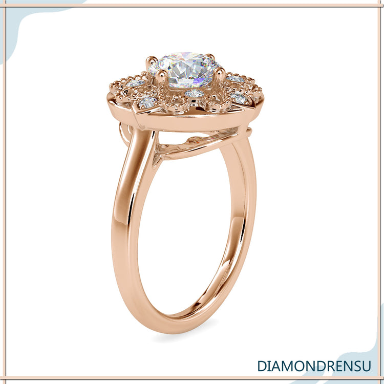 Custom engagement ring featuring antique style and four prong mount.