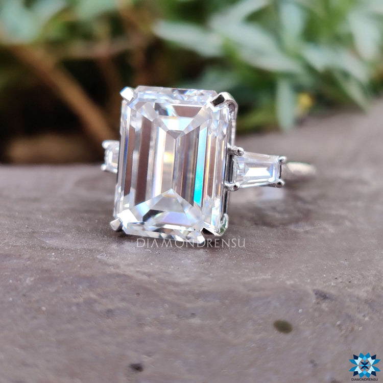 Handmade ring with tapered baguette side stones.