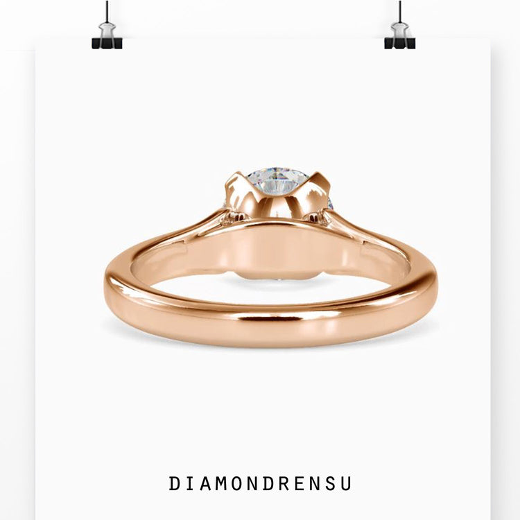 Handmade jewellery ring with solitaire diamond in 4 prong.