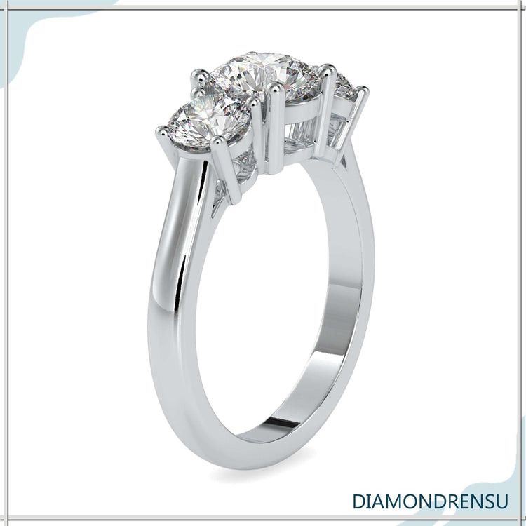 Custom design ring with lab grown three stone setting.