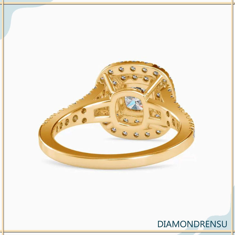 Double halo cushion ring featuring custom design in white gold.