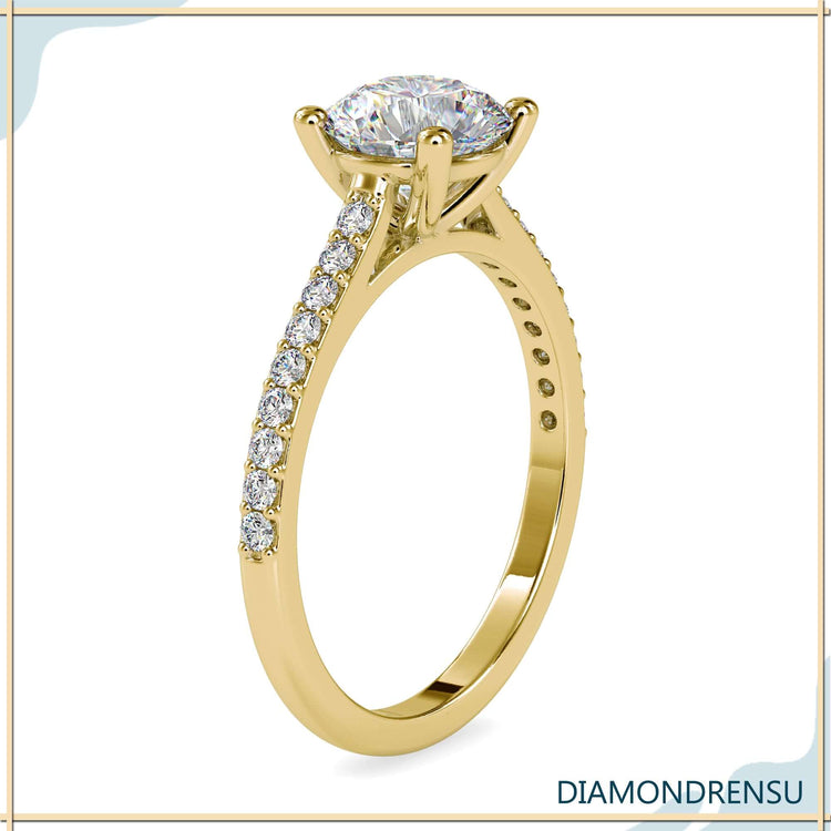 Buy engagement ring with round cut diamond and pave setting.