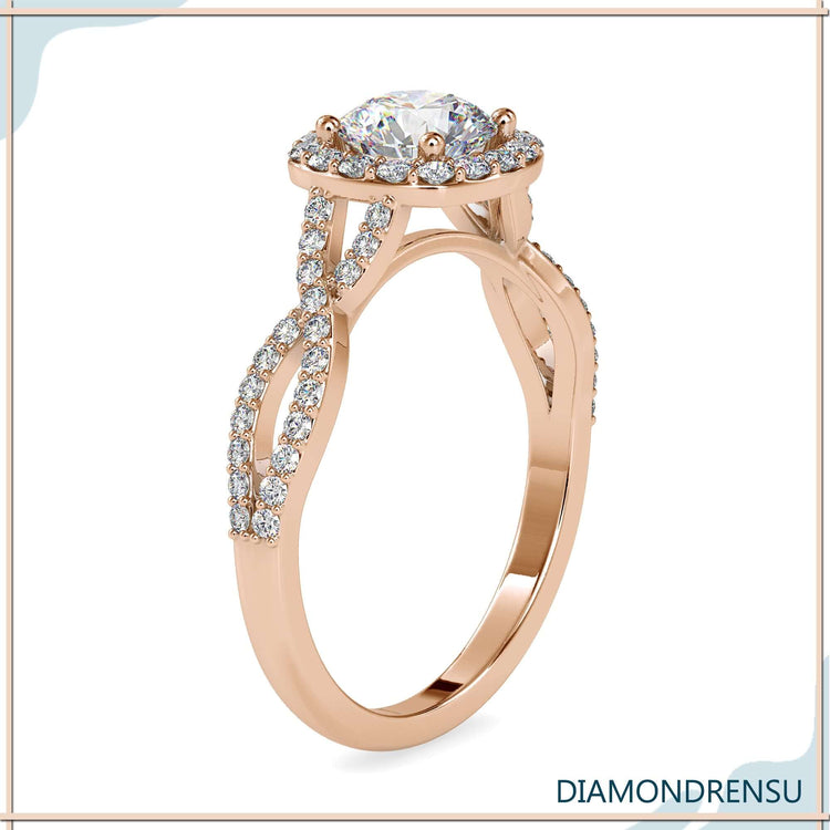 Buy engagement ring with round prong setting and twisted diamond band.