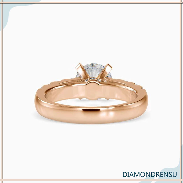 4 prong setting ring with lab grown round cut diamond.