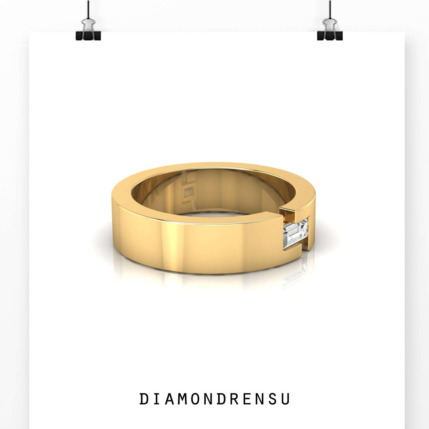 Gold baguette diamond ring in minimalist diamond wedding ring style.