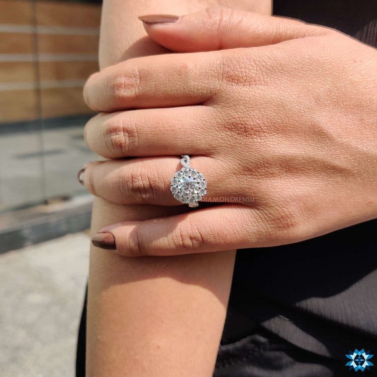 Moissanite ring with twisted pave band.