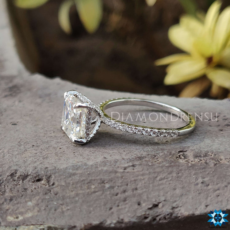 Custom Moissanite engagement ring with pave details and Asscher cut design.
