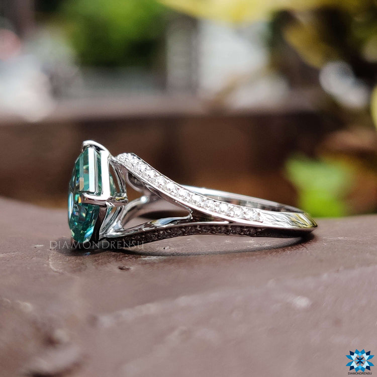 White gold ring featuring split shank pave band.