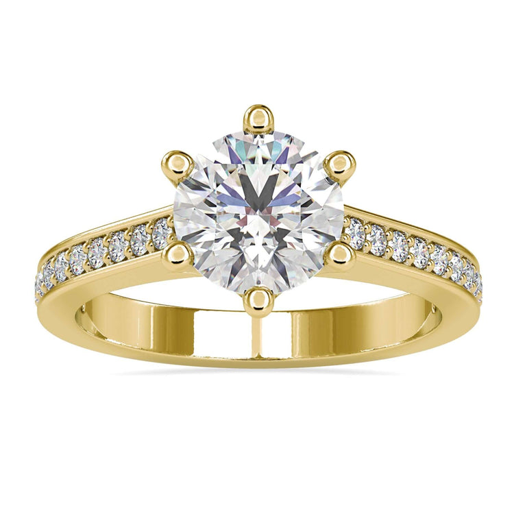 Channel set engagement ring with round cut lab grown diamond.