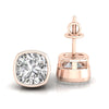 Cushion cut diamond earrings with bezel setting in white gold.