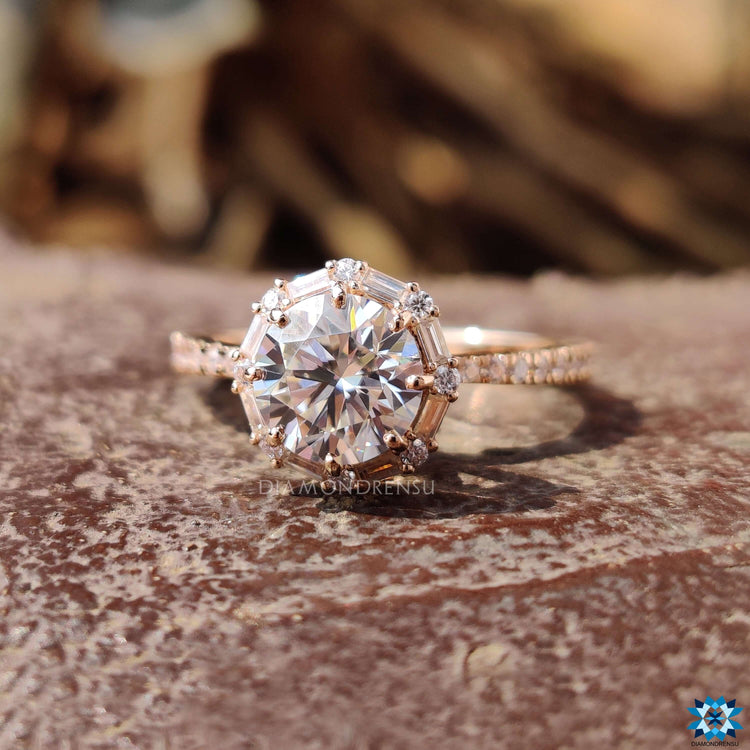Baguette cut halo setting on rose gold ring.