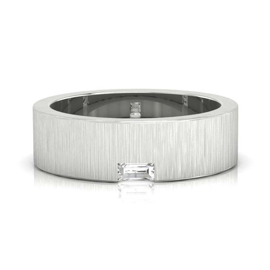 Brushed finish wedding band with single baguette diamond.