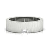 Brushed finish wedding band with single baguette diamond.