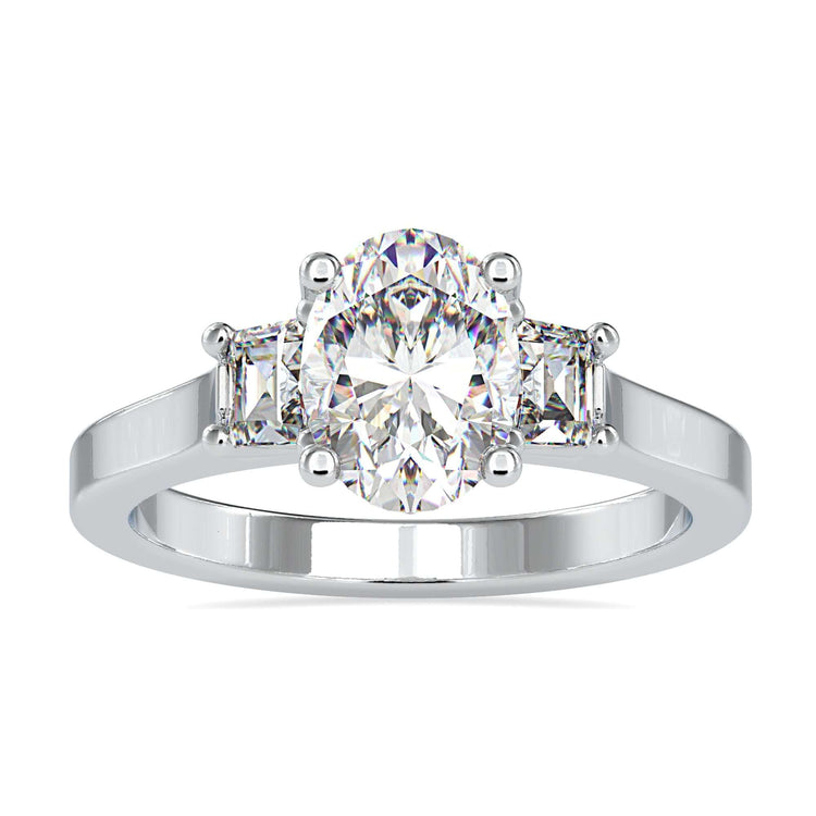 Three stone ring with oval centre diamond and trapezium sides.