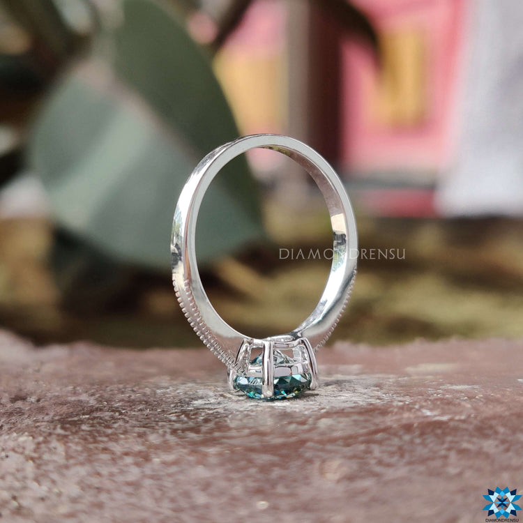 Custom engagement ring featuring Portuguese moissanite.