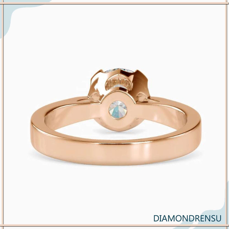Round diamond solitaire ring with handmade jewellery look.
