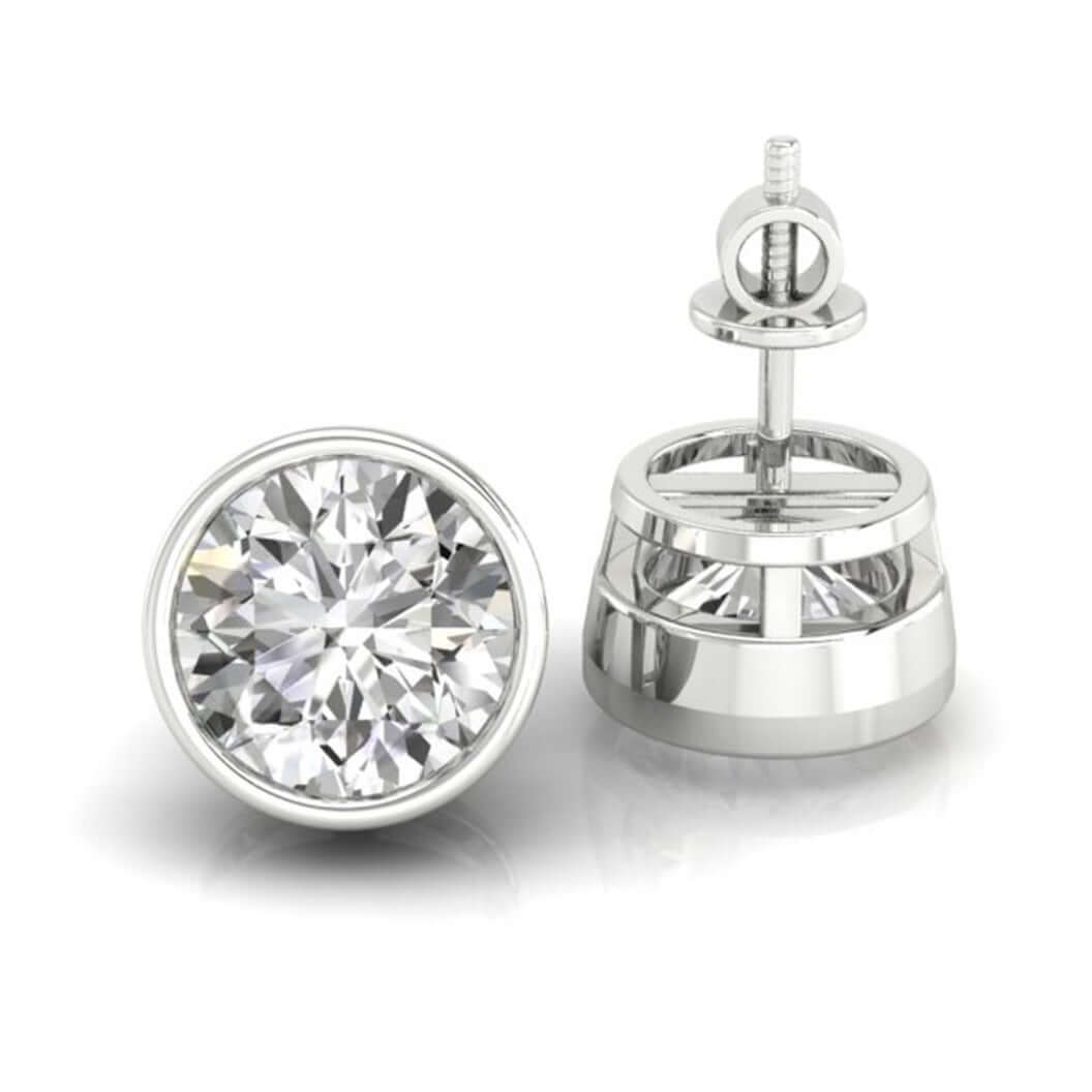 Stud earrings for women featuring round bezel set diamonds.