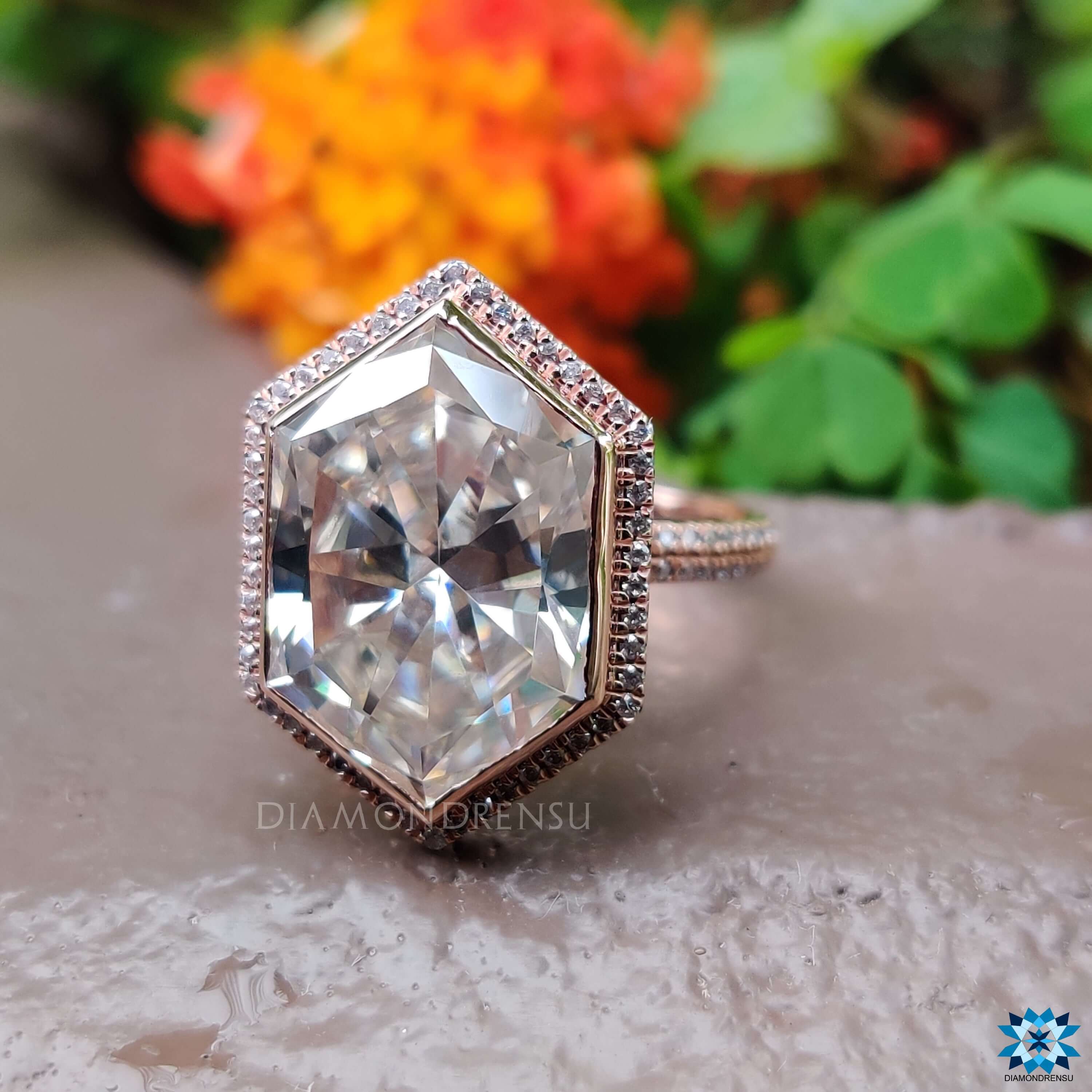 Handmade rose gold engagement ring with hexagon cut.