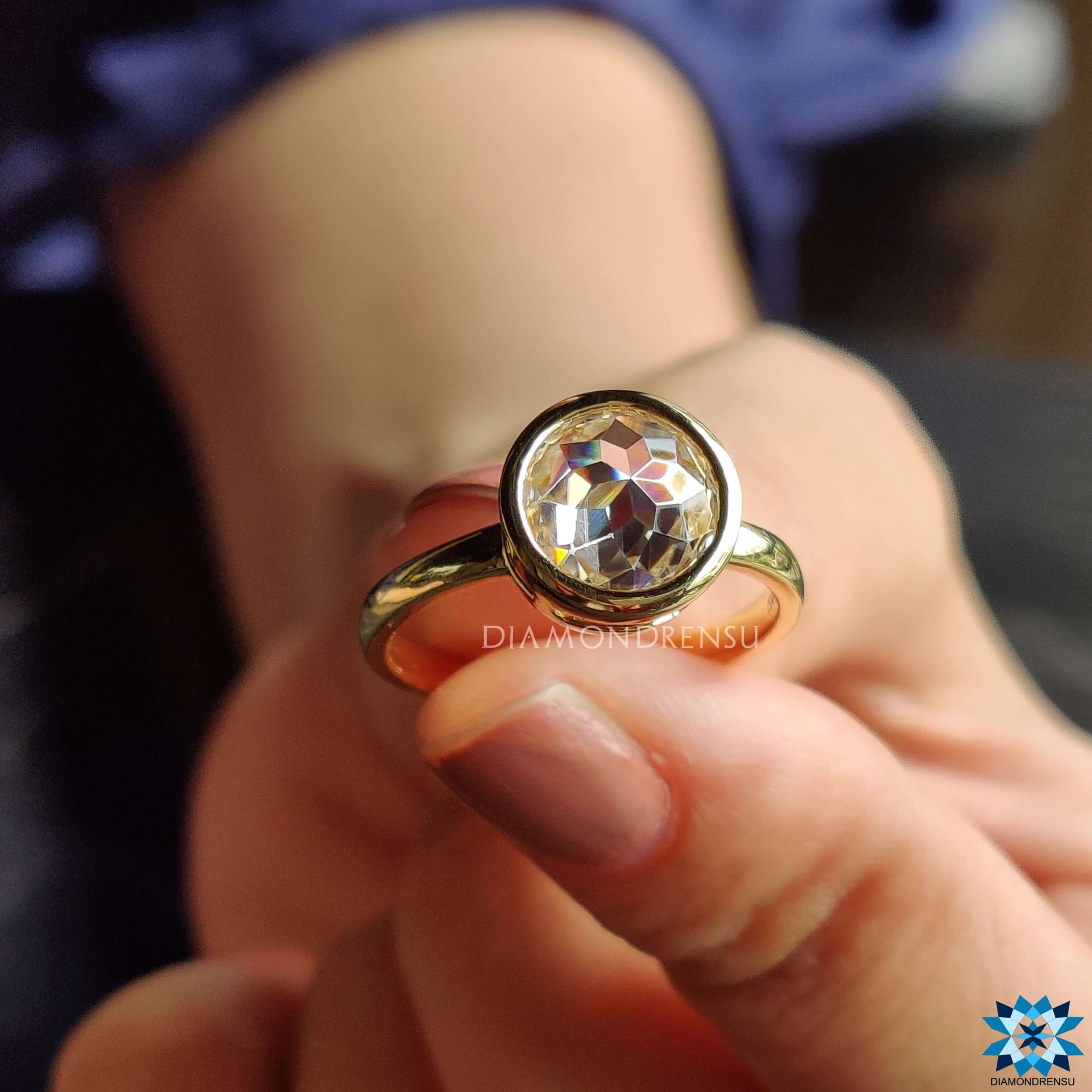 Stunning yellow gold moissanite ring for a warm and luxurious touch.