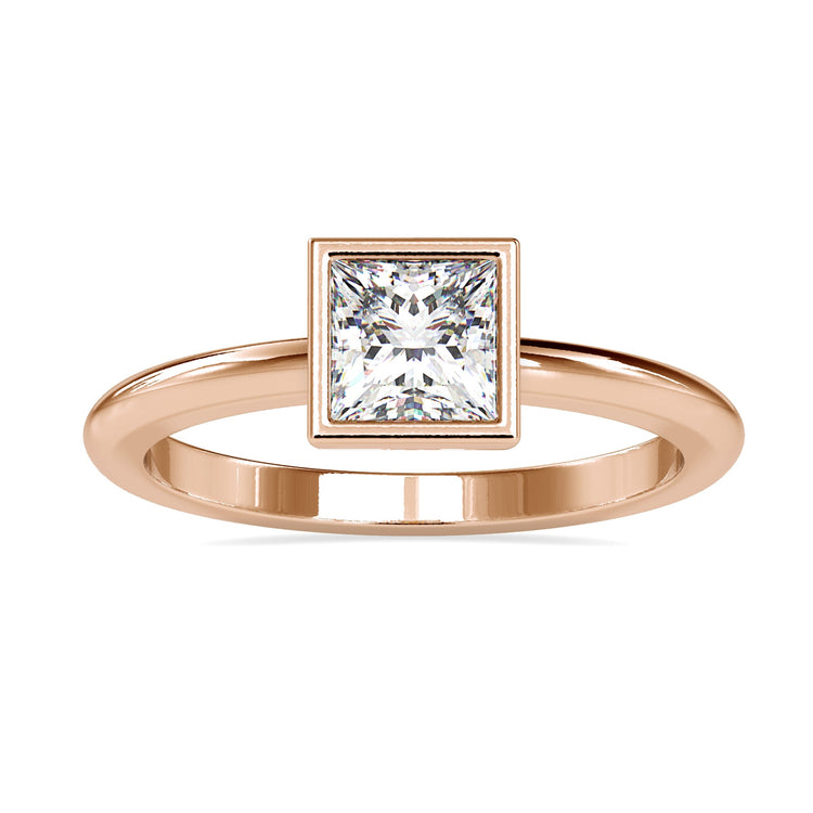 Princess diamond ring in white gold with bezel solitaire setting.