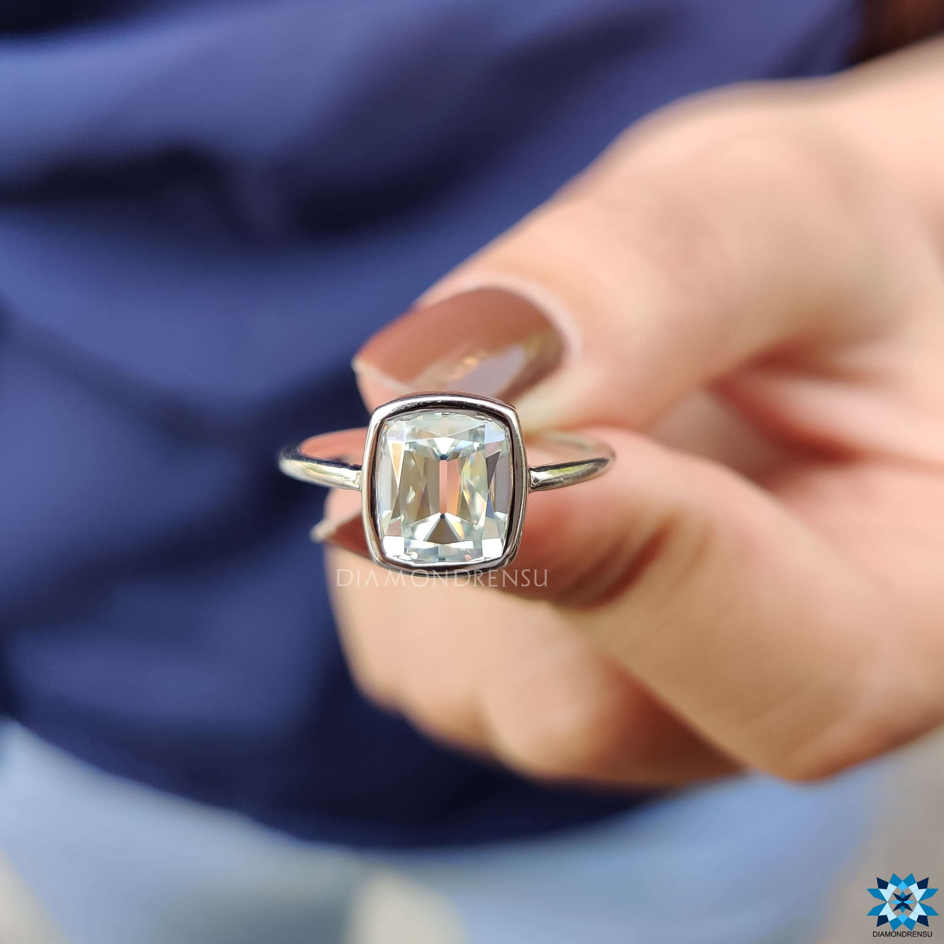 Handmade white gold ring with old European cut cushion moissanite.