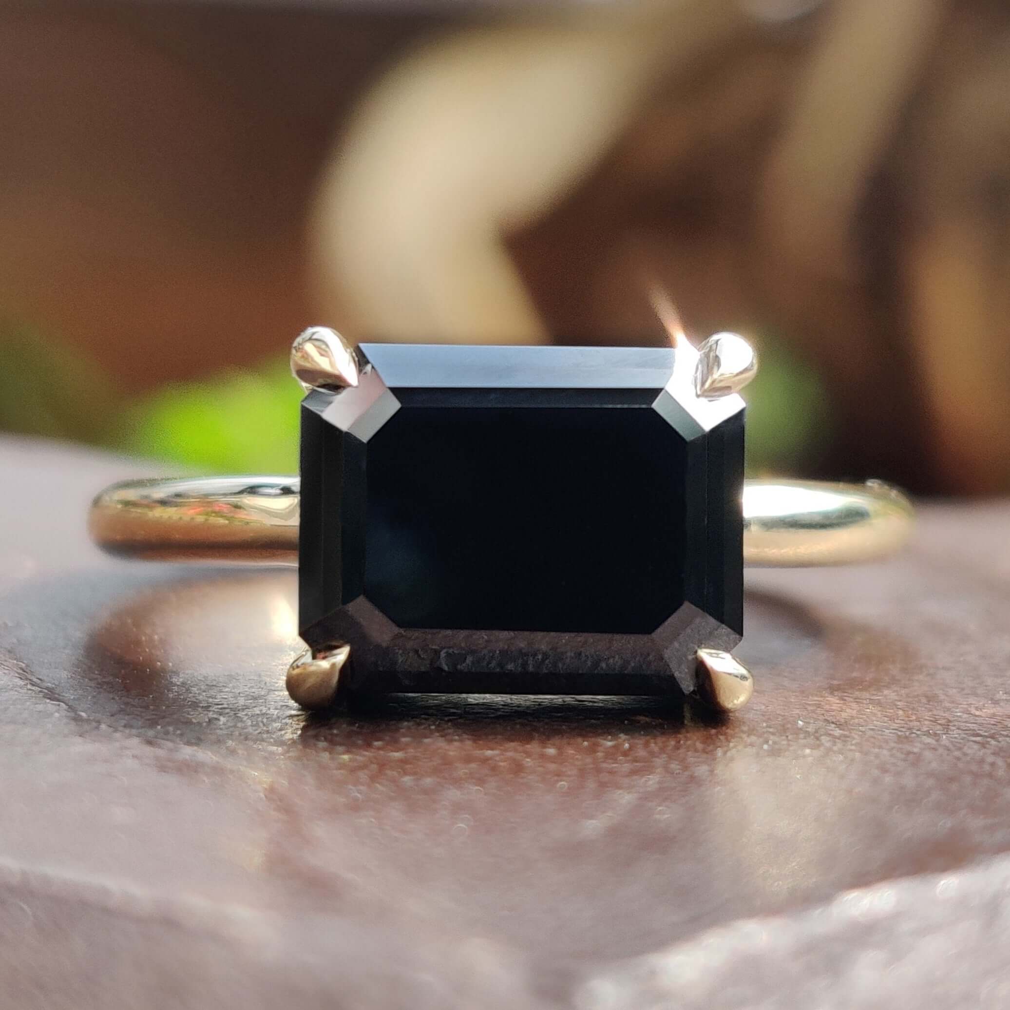 Black moissanite engagement ring.