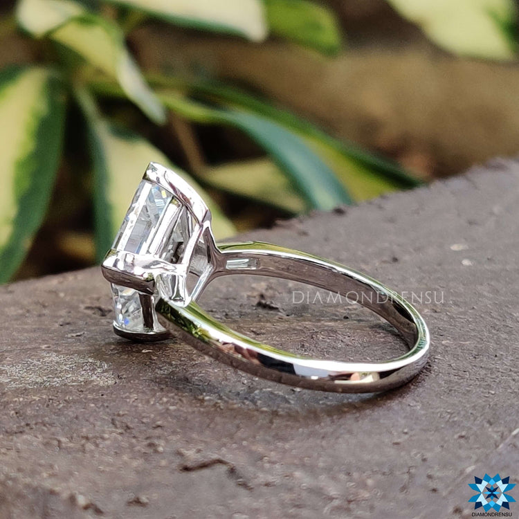 Handmade white gold ring with lozenge cut moissanite.