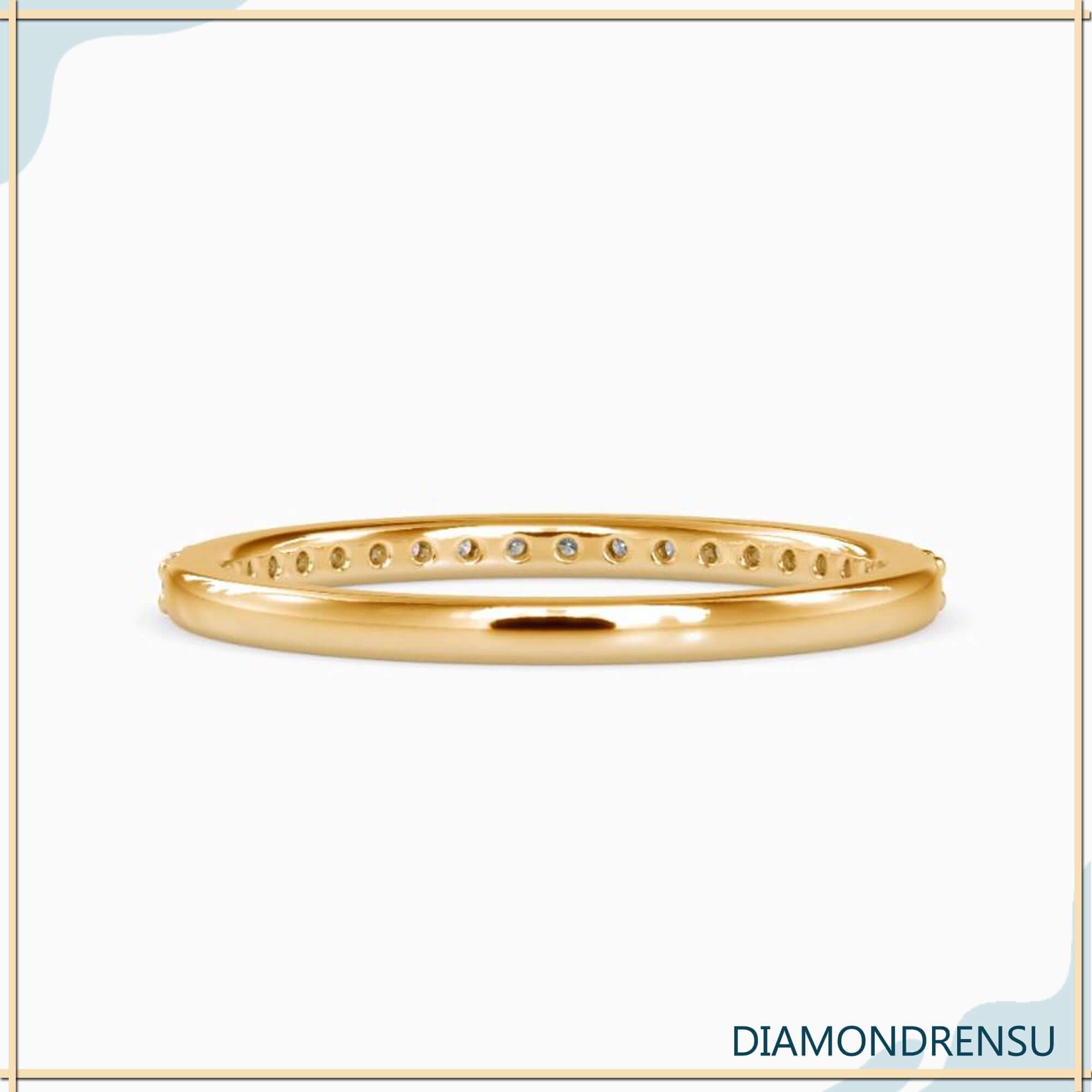 Round diamond wedding band with semi eternity setting.