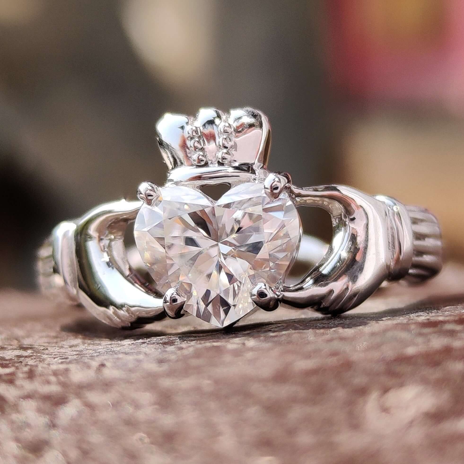 Claddagh engagement ring with heart shaped moissanite.