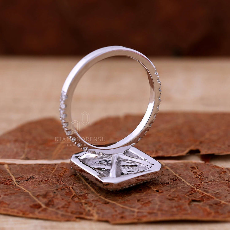 Pave diamond ring with a radiant halo engagement ring style, crafted as handmade jewelry for a special occasion.