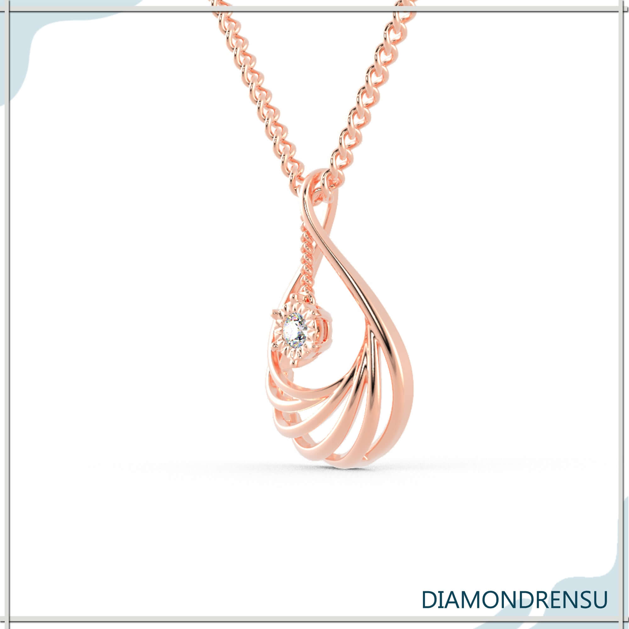 Handmade jewellery pendant with teardrop outline and round centre diamond.