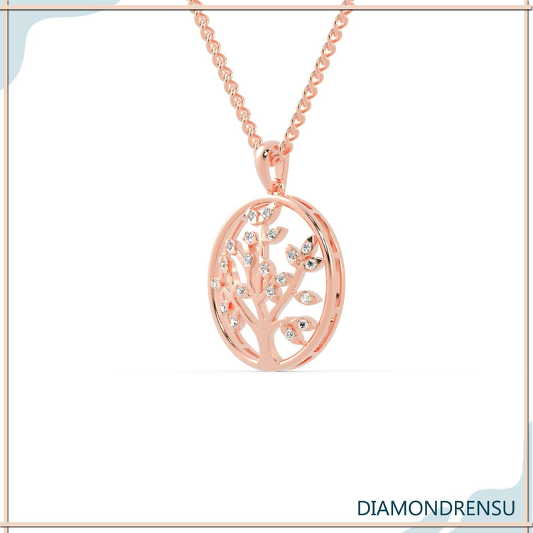 UK diamond pendant featuring a graceful tree life silhouette.