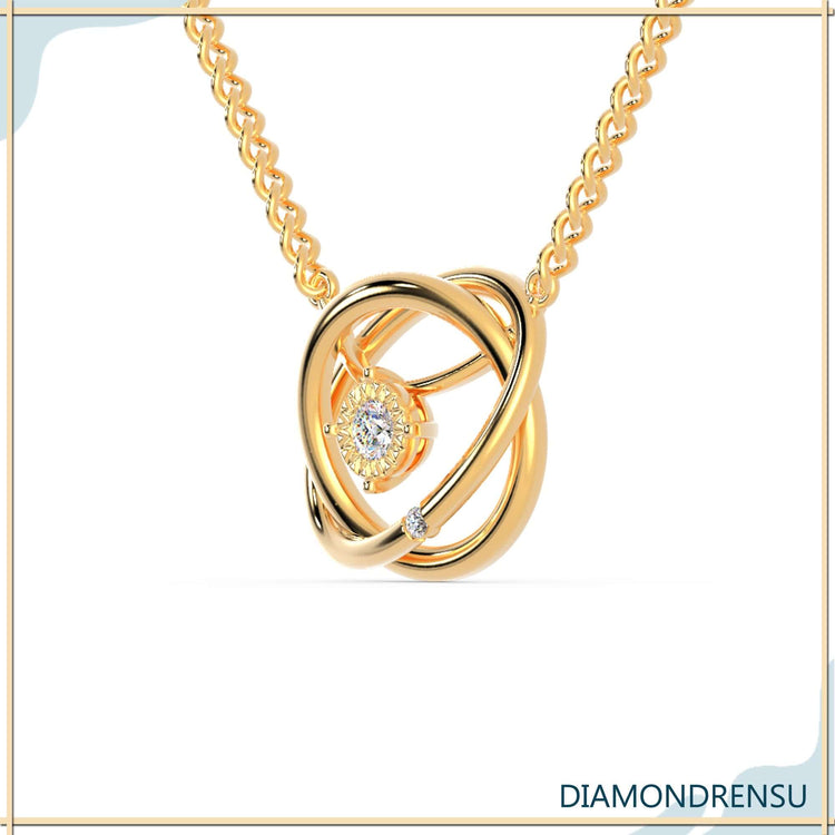 Handmade interlocking pendant with gold chain and diamonds.