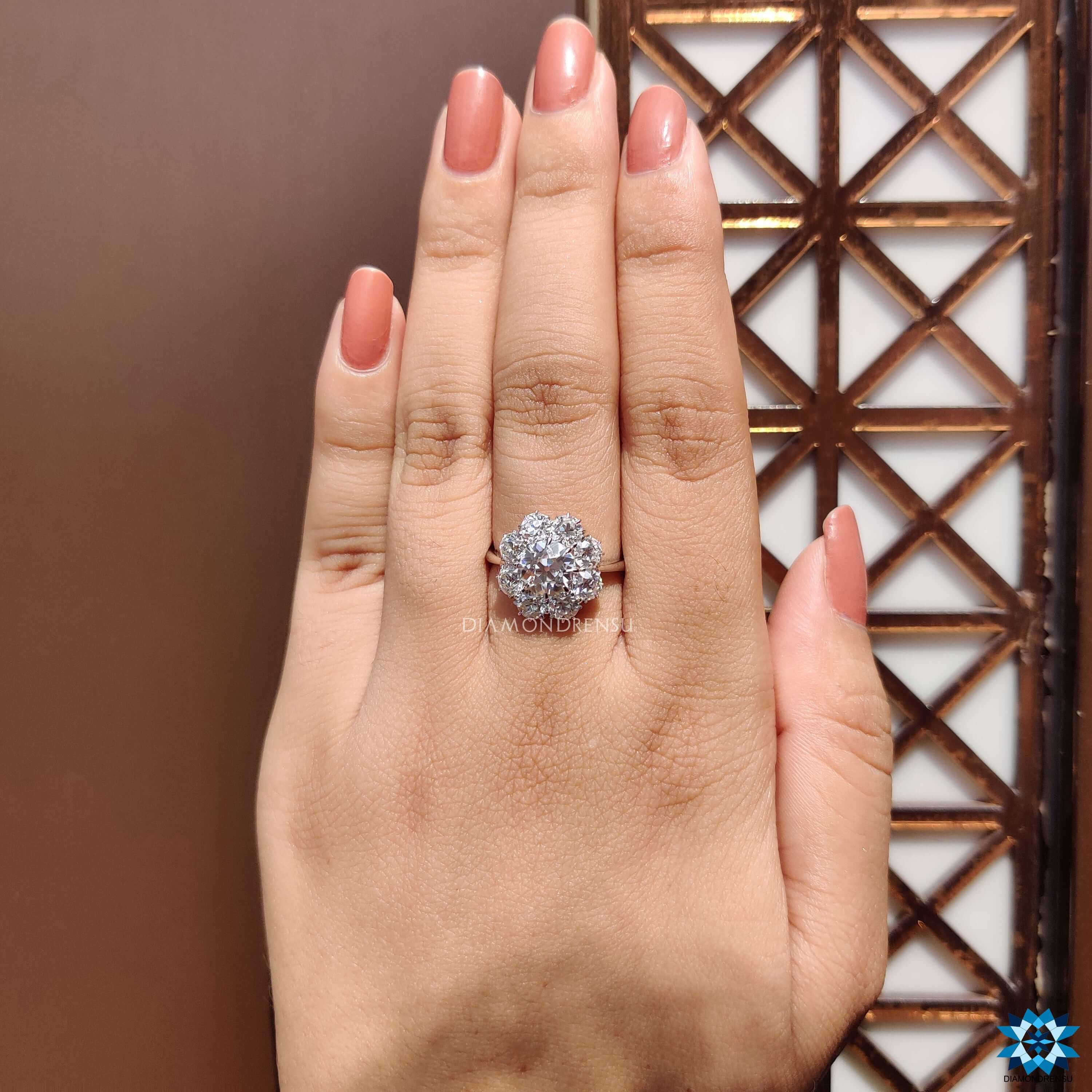 Moissanite engagement ring with claw prongs.