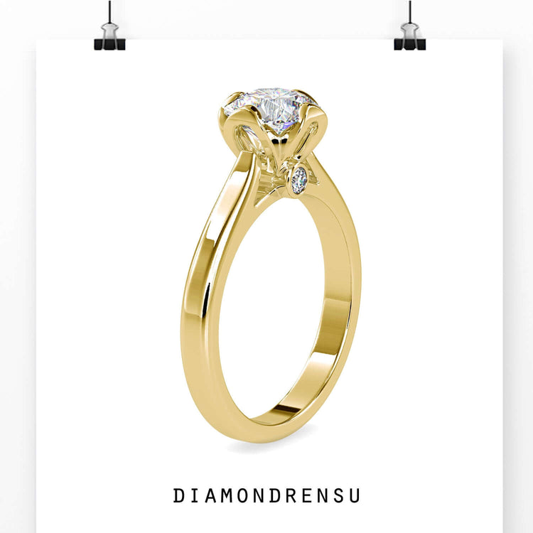 White gold engagement ring with peekaboo diamond and clean finish.