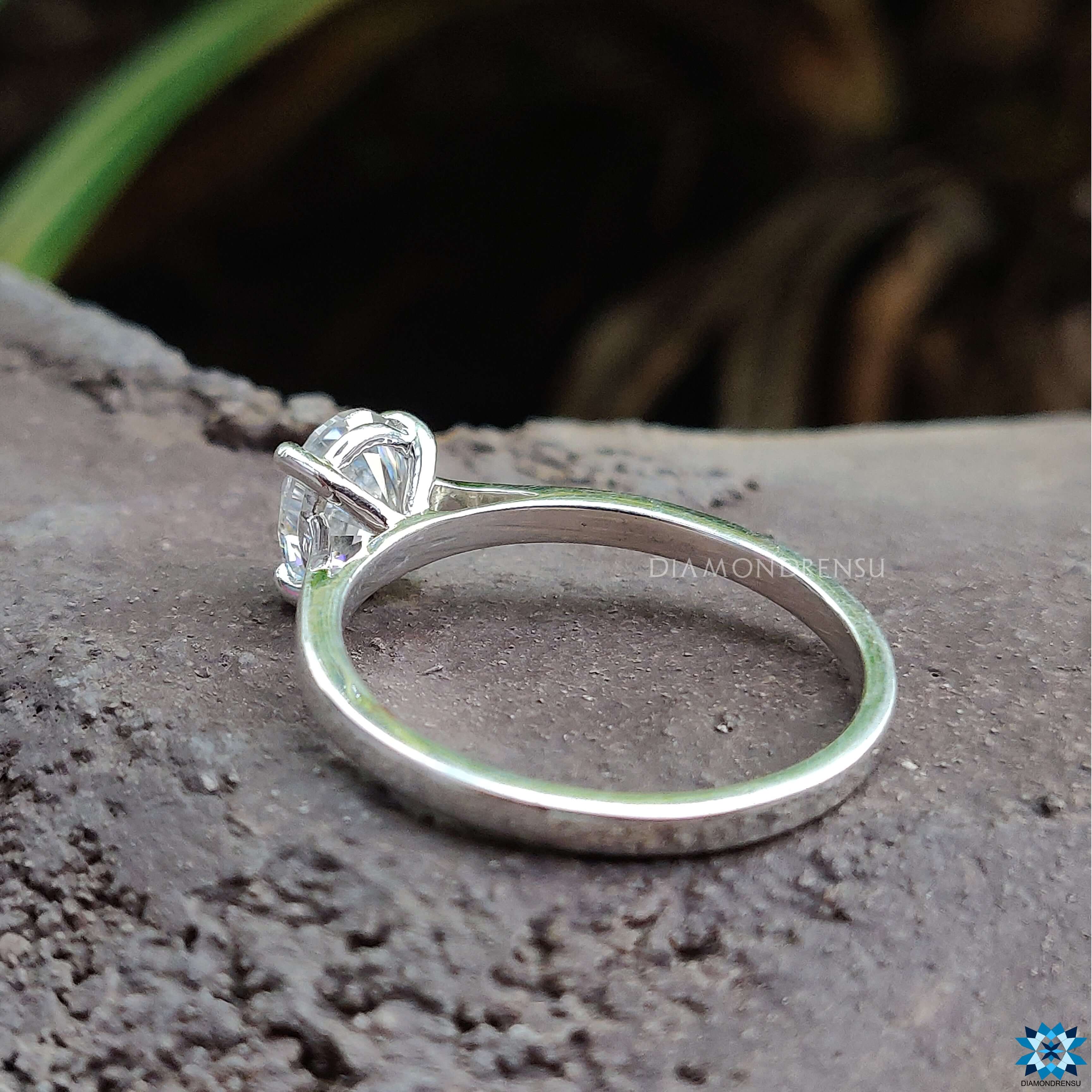 White gold engagement ring featuring an oval moissanite for engagement ring.