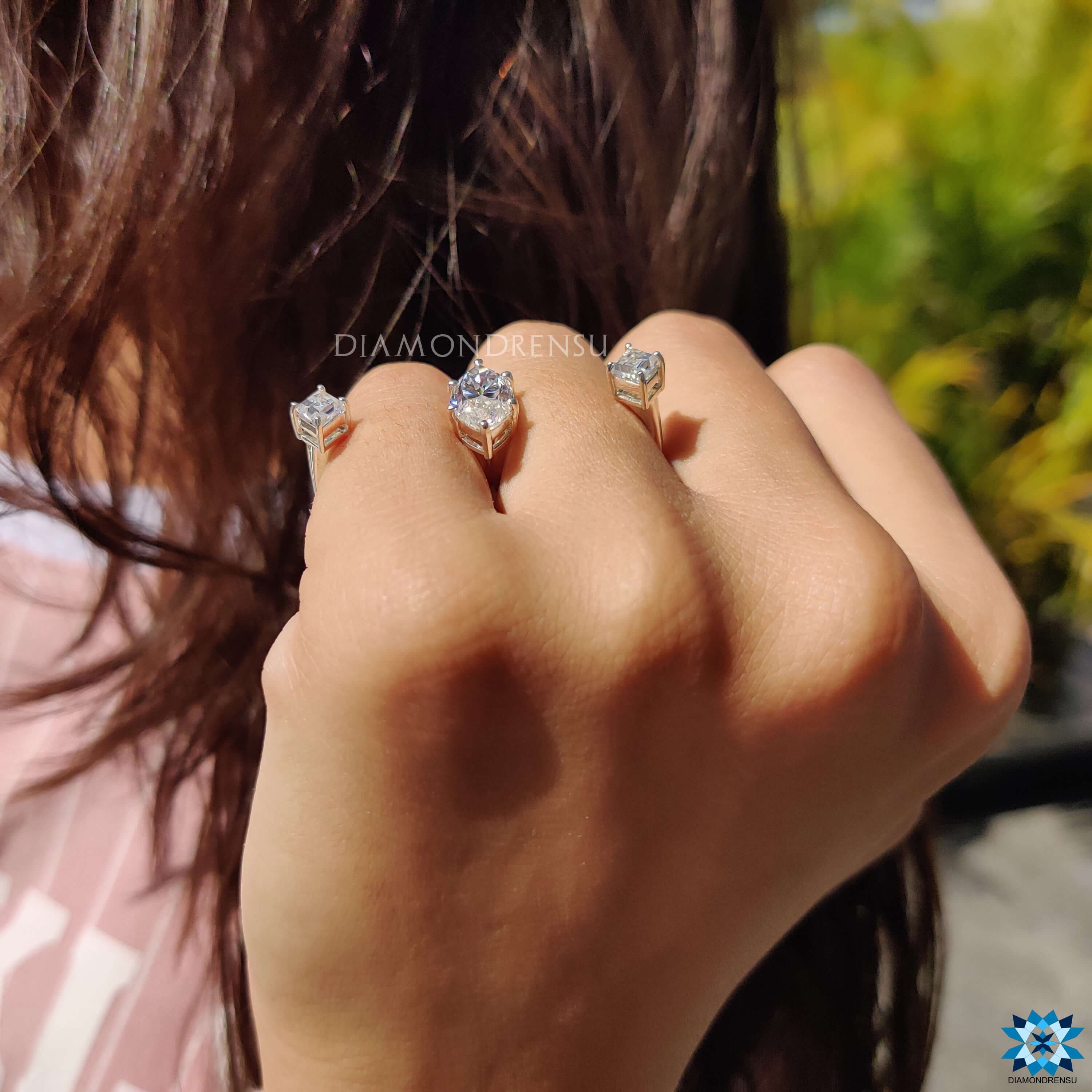 White gold dual band ring with marquise and lozenge stones.