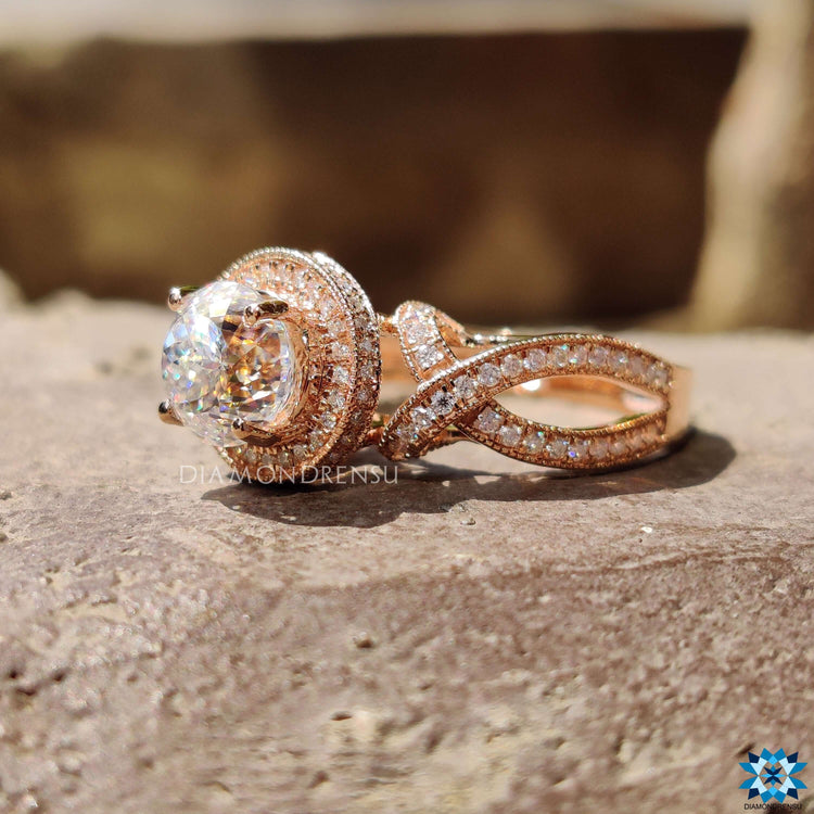 Vintage style moissanite ring with halo design.