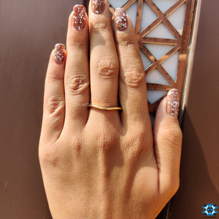 Curved wedding band with engagement ring for a flawless match.