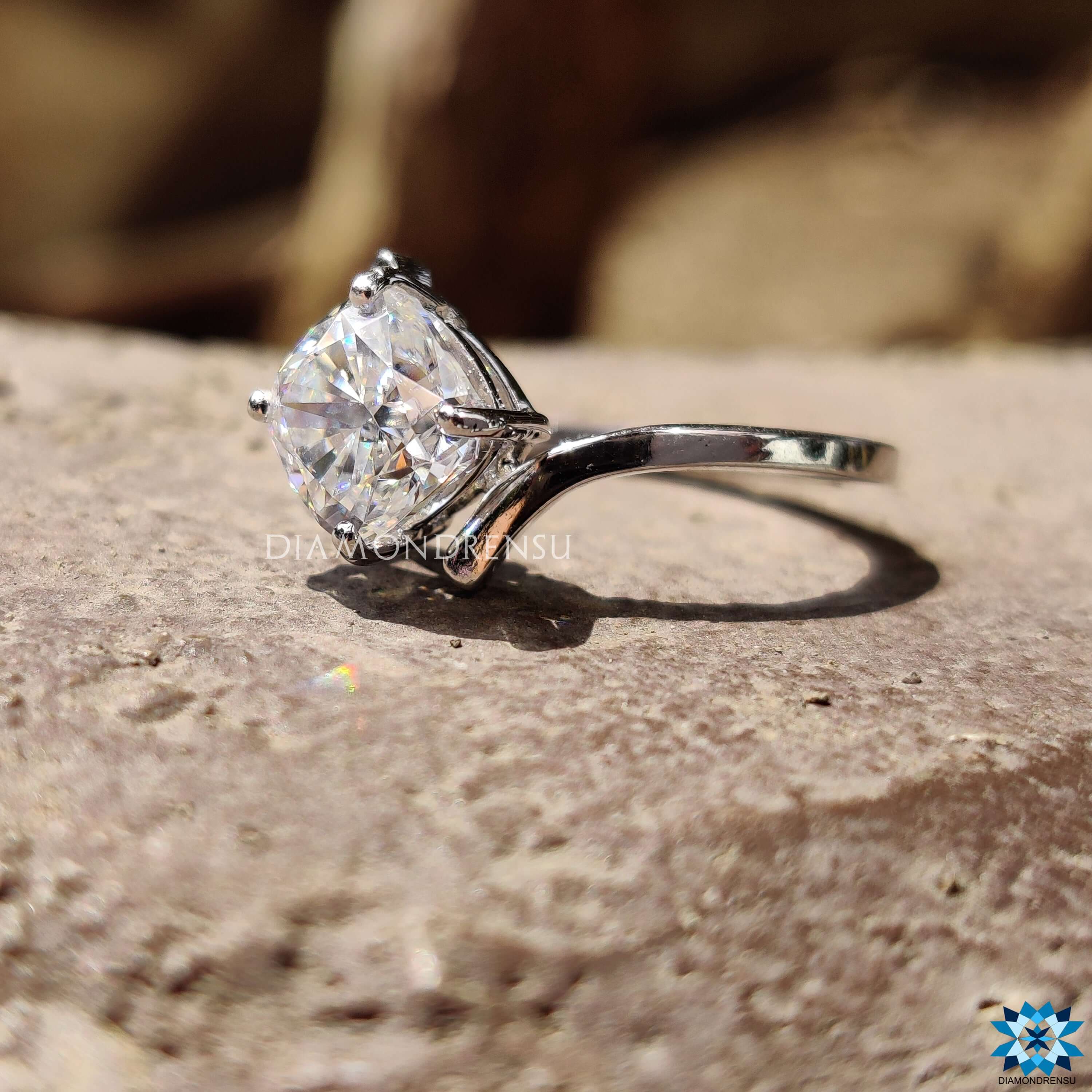 Diamondrensu UK cushion moissanite ring with bypass design.