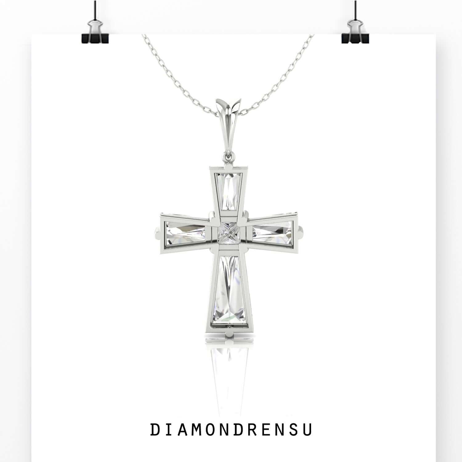Cross pendant in rose gold with lab grown diamond detail.