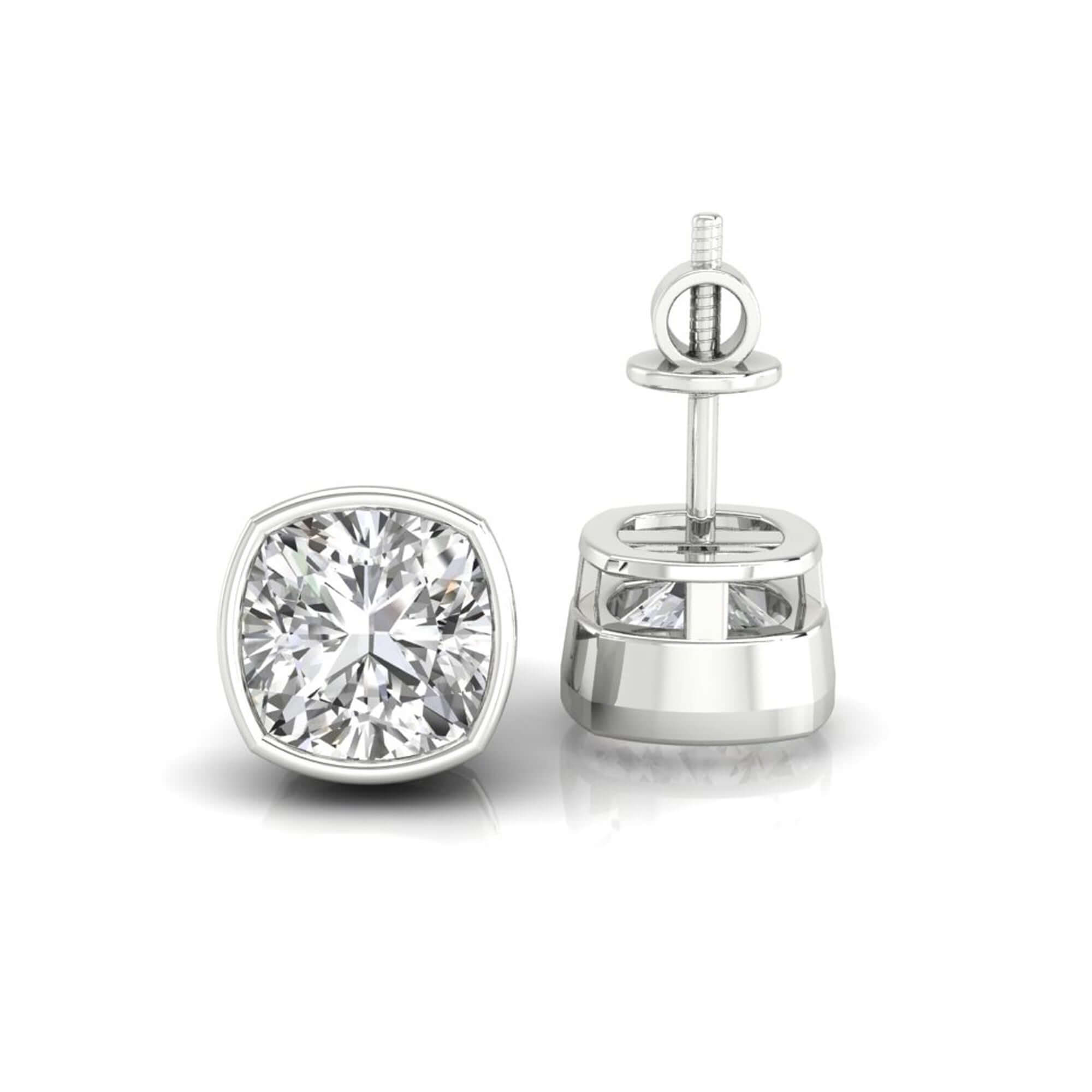 Handmade jewellery featuring cushion cut bezel set diamond studs.