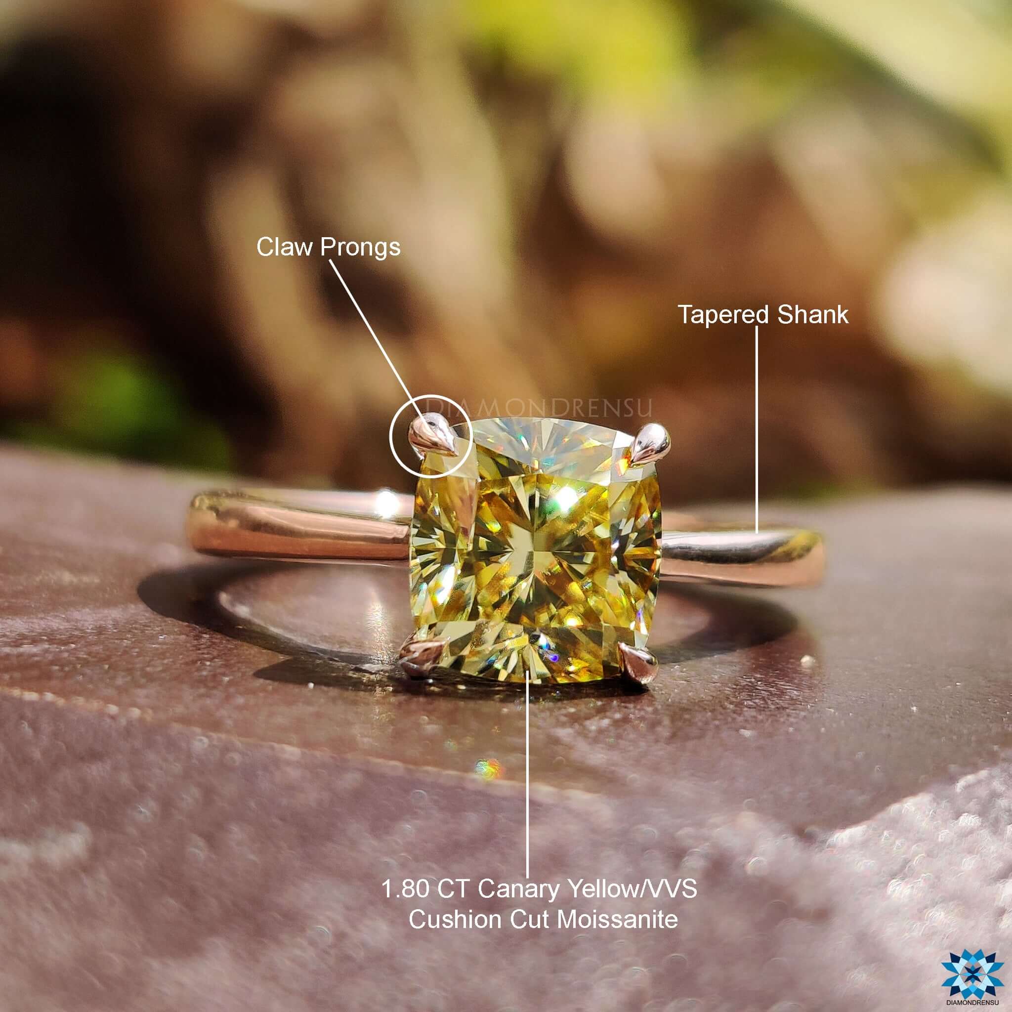 Moissanite engagement ring in a classic 4 prong setting.