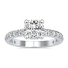 Cushion cut diamond ring with prong setting in white gold.